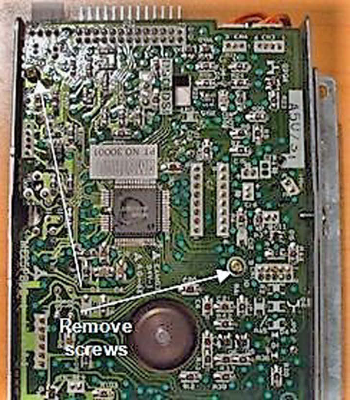to lose any washers securing the controller board to the drive noting ...